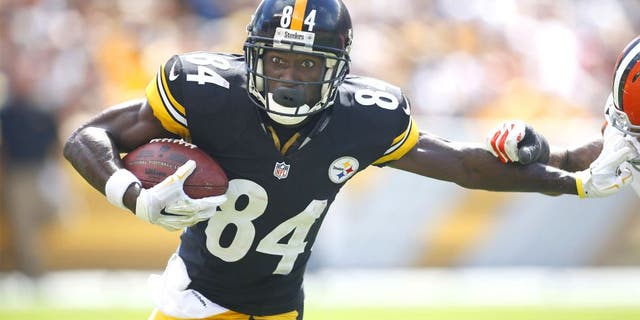 Sep 7, 2014; Pittsburgh, PA, USA; Pittsburgh Steelers wide receiver Antonio Brown (84) runs after a pass reception against the Cleveland Browns during the second quarter at Heinz Field. Mandatory Credit: Charles LeClaire-USA TODAY Sports