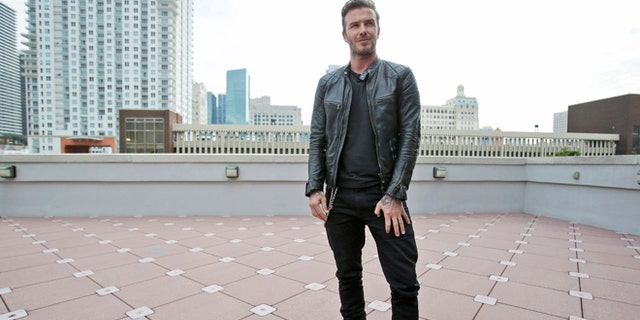 FILE - In this March 24, 2014, file photo, former England soccer star David Beckham.