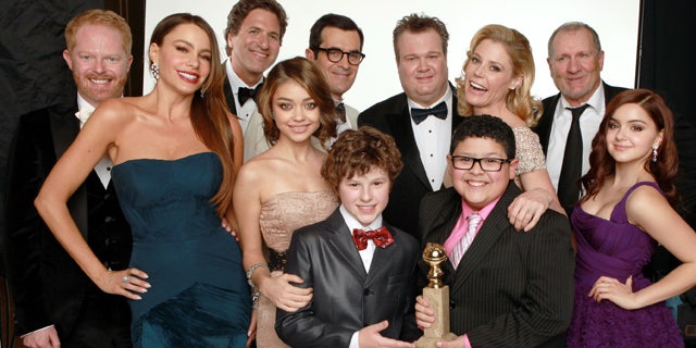 BEVERLY HILLS, CA - JANUARY 15: (L-R) Actors Jesse Tyler Ferguson, Sofia Vergara, creator/producer Steven Levitan, actors Sarah Hyland, Ty Burrell, Nolan Gould, Eric Stonestreet, Julie Bowen, Rico Rodriguez, Ed O'Neill and Ariel Winter, winners of the Best Television Series - Musical or Comedy award for