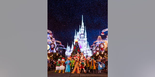 Disney characters dressed in their holiday finest parade down Main Street, U.S.A., at Magic Kingdom during "Mickey's Once Upon a Christmastime Parade." The festive processional is one of the happy highlights of Mickey's Very Merry Christmas Party, a night of holiday splendor with lively stage shows, a unique holiday parade, Holiday Wishes: Celebrate the Spirit of the Season nighttime fireworks, and snow flurries on Main Street, U.S.A. The special-ticket event takes place on select nights in November and December in Magic Kingdom at Walt Disney World Resort in Lake Buena Vista, Fla. (Ryan Wendler, photographer)