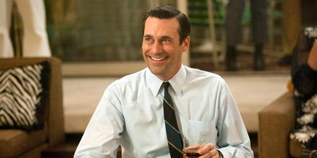 FILE - In this file photo released by AMC, Jon Hamm portrays advertising executive Don Draper in a scene from the fifth season premiere of "Mad Men."