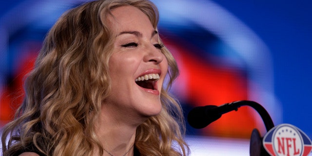 Madonna speaks during a news conference for NFL footbal's Super Bowl XLVI's halftime show Thursday, Feb. 2, 2012, in Indianapolis. (AP Photo/Matt Slocum)