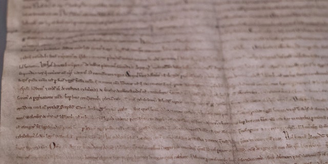 A close-up view of one of four remaining copies of the original Magna Carta, a document written in 1215, is seen at the Museum of Fine Arts in Boston June 30, 2014.