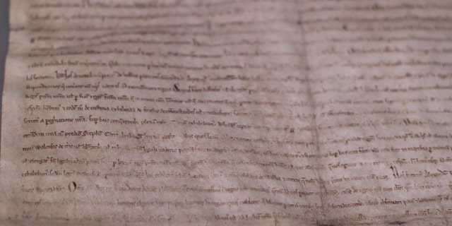 A close-up view of one of four remaining copies of the original Magna Carta, a document written in 1215, is seen at the Museum of Fine Arts in Boston June 30, 2014.