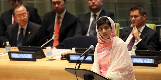 July 12, 2013: United Nations Secretary-General Ban Ki-moon, left, listens as Malala Yousafzai, right, addresses the Malala Day Youth Assembly at United Nations headquarters.