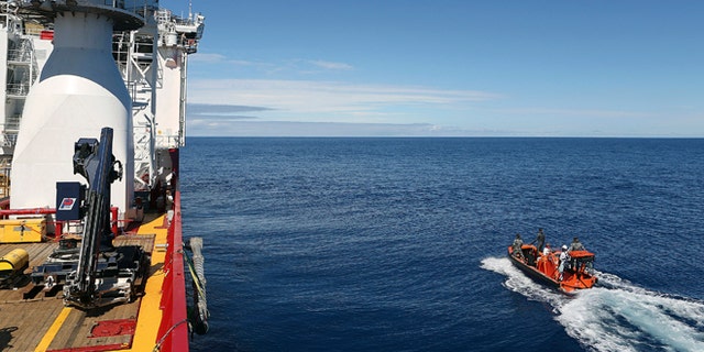 In this April 7, 2014 photo provided by the Australian Defense Force a fast response craft manned by members ofthe Australian Defense's ship Ocean Shield is deployed to scan the water for debris of the missing Malaysia Airlines Flight 370 in the southern Indian Ocean. Up to 14 planes and as many ships were focusing on a single search area covering 77, 580 square kilometers (29,954 square miles) of ocean, 2,270 kilometers (1,400 miles) northwest of the Australian west coast city of Perth, Australia. (AP Photo/Australian Defense Force, LSIS Bradley Darvill) EDITORIAL USE ONLY