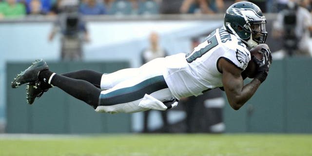Sep 21, 2014; Philadelphia, PA, USA; Philadelphia Eagles free safety Malcolm Jenkins (27) intercepts a pass in the fourth quarter against the Washington Redskins at Lincoln Financial Field. The Eagles defeated the Redskins, 37-34. Mandatory Credit: Eric Hartline-USA TODAY Sports
