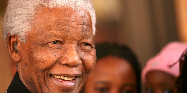June 13, 2006 - FILE photo of former South African President Nelson Mandela in Johannesburg.