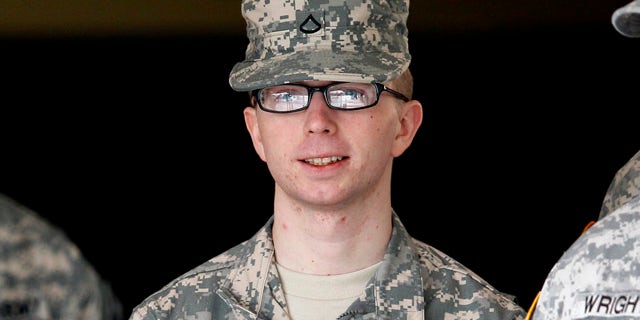 Dec. 22, 2011: Army Pfc. Bradley Manning is escorted from a courthouse in Fort Meade, Md.