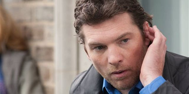 In this film image released by Summit Entertainment, Sam Worthington is shown in a scene from "Man on a Ledge." (AP Photo/Summit Entertainment, Myles Aronowitz)