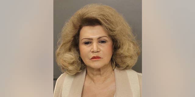 This undated photo provided by the Pennsylvania Office of Attorney General shows Claire Risoldi. The state attorney general's office announced, Thursday, Jan. 22, 2015, the arrest of the 67-year-old Risoldi and four relatives. Counts against Risoldi include conspiracy, witness intimidation and forgery. The investigation began after a 2013 fire at Risoldi's mansion near Philadelphia. It was the third blaze in five years. (AP Photo/Pennsylvania Office of Attorney General)