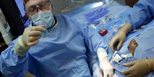 A surgeon at work.