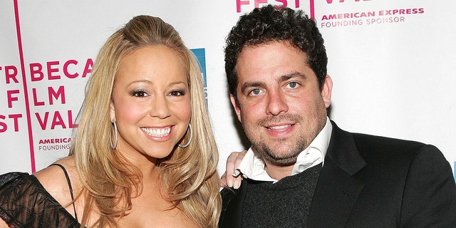 NEW YORK - APRIL 19:  Singer Mariah Carey and Director Brett Ratner attend "The Interpreter" premiere at the Ziegfeld Theatre April 19, 2005 in New York City.  (Photo by Evan Agostini/Getty Images)