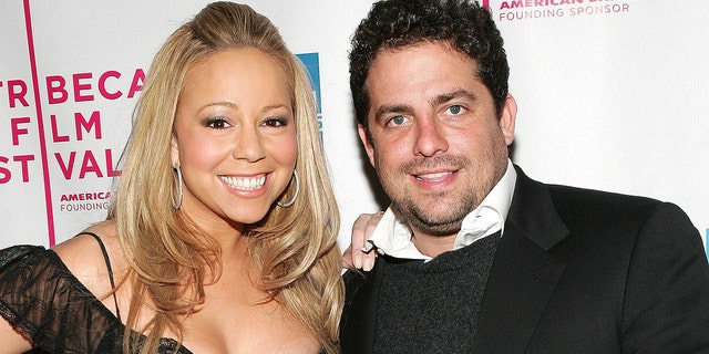 NEW YORK - APRIL 19: Singer Mariah Carey and Director Brett Ratner attend "The Interpreter" premiere at the Ziegfeld Theatre April 19, 2005 in New York City. (Photo by Evan Agostini/Getty Images)