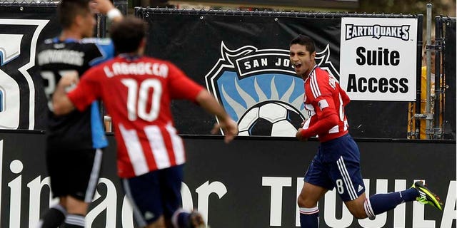 Chivas USA's Mariano Trujillo (8) celebrates after scoring against the San Jose Earthquakes during the second half of an MLS soccer game in Santa Clara, Calif., Saturday, April 23, 2011. Chivas USA won 2-1. (AP Photo/Marcio Jose Sanchez)