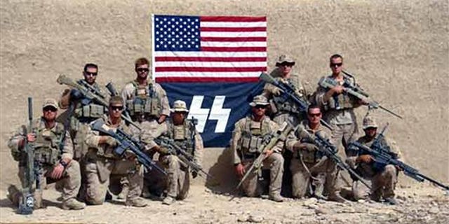 This Sept. 2010 photo posted recently on the Titiusville, Florida-based arms manufacturer Knight's Armament's Internet blog, shows members of Charlie Company, 1st Reconnaissance Battalion, out of Camp Pendleton, Calif. in Sangin, Helmand province, Afghanistan.
