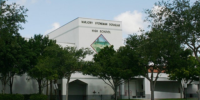 An unarmed campus monitor at Marjory Stoneman Douglas High School told police officers he warned school staff about Nikolas Cruz as the stormed the campus.