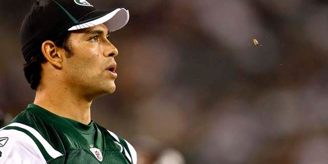 EAST RUTHERFORD, NJ - SEPTEMBER 01: Mark Sanchez #6 of the New York Jets spits out a sunflower seed during their pre-season game at MetLife Stadium on September 1, 2011 in East Rutherford, New Jersey. (Photo by Jeff Zelevansky/Getty Images)