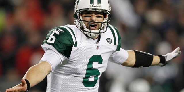 Jan. 16, 2011: New York Jets quarterback Mark Sanchez celebrates his touchdown pass to Santonio Holmes during the second half.