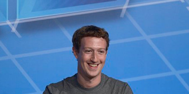 FILE - This Feb. 24, 2014 file photo shows Facebook Chairman and CEO Mark Zuckerberg during a conference in Barcelona, Spain. President Barack Obama is meeting with CEOs from leading Internet and technology companies to discuss their concerns about privacy and National Security Agency programs. The White House says Obama will host the leaders Friday in the Oval Office. The meeting comes two months after Obama gave a speech proposing changes to NSA spying programs following public and industry concern. Google CEO Eric Schmidt and Netflix CEO Reed Hastings will join the meeting. So will Drew Houston of the file storage site Dropbox and Mark Zuckerberg of Facebook. (AP Photo/Manu Fernandez, File)