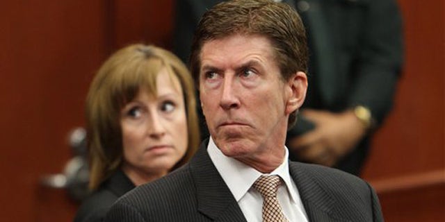 April 27, 2012: Attorney Mark O'Mara, right, and associate Lorna Truett appear in court on behalf of their client George Zimmerman during a hearing in his trial in Sanford, Fla.