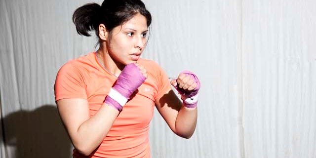 Marlen Esparza, a Houston-based boxing, is fighting to make history at the 2012 Olympics.