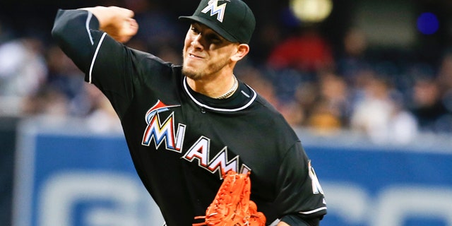 Miami Marlins starting pitcher Jose Fernandez works the first inning against the San Diego Padres during a baseball game on Friday, May 9, 2014, in San Diego. (AP Photo/Lenny Ignelzi)