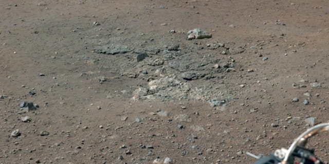 Aug. 17,2012: This image shows bedrocks that was exposed after Curiosity's rocket stage fired its engines that blew away soil from the Martian surface.