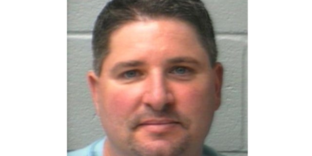 This photo, released by the Middlesex County District Attorney's office, shows 39-year-old murder suspect Christopher Piantedosi, of Methuen, Mass.