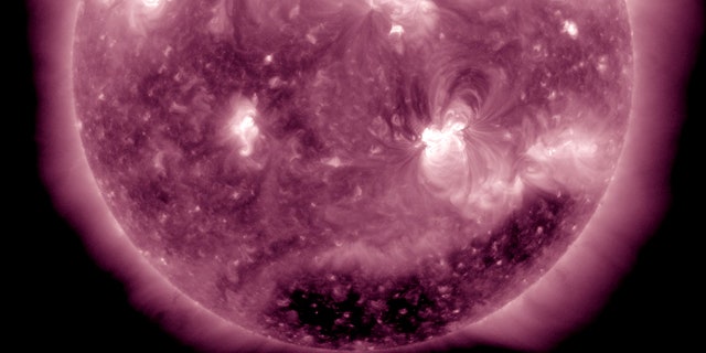An X2.2 flare erupted from the sun's active region 1158 (at lower right) at about 0150 UT or 8:50 pm ET on February 14.