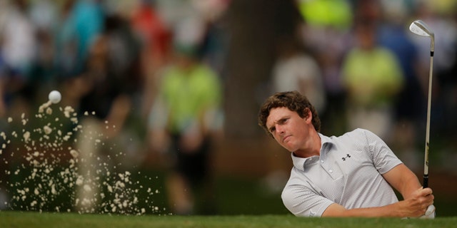 Amateur Matias Dominguez, of Chile, hits to the seventh green during a practice round for the Masters golf tournament Tuesday, April 7, 2015, in Augusta, Ga. (AP Photo/Matt Slocum)