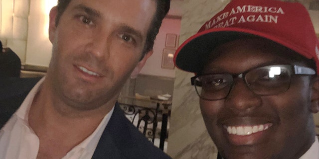 20-year-old Matthew Handy of Kentucky in a recent photo with President Trump's son, Donald Trump Jr. Handy, an intern for a Republican lawmaker, says an Uber driver refused to give him and three others a ride together in Washington this week because two of them were carrying pro-Trump “Make America Great Again” hats.