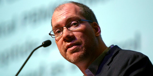 Timothy Henrich of the Harvard-affiliated Brigham and Women's Hospital in Boston speaks at the International AIDS Society Conference 2013 in Kuala Lumpur, Malaysia.