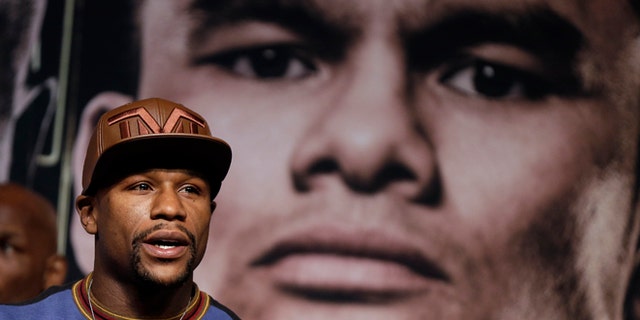Boxer Floyd Mayweather Jr. speaks during a news conference Wednesday, April 30, 2014, in Las Vegas.
