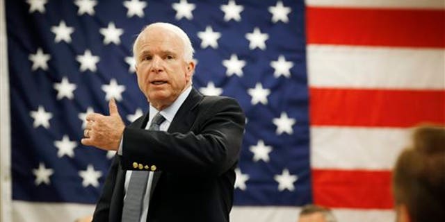 Tuesday, June 30, Sen. John McCain, R-Ariz., speaks with employees at Robertson Fuel Systems, in Tempe, Arizona.