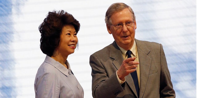 FILE: Senate Minority Leader Mitch McConnell, R-Ky., and his wife, former Labor Secretary Elaine Chao at the Republican National Convention in Tampa, Fla.
