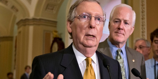 FILE: June 11, 2013: Then-Senate Minority Leader Mitch McConnell, R- Ky., left, and Minority Whip John Cornyn, R-Texas, speak with reporters on Capitol Hill, in Washington, D.C.