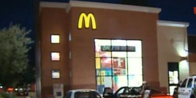 Three armed suspects robbed a McDonalds near Baseline Road and Priest Drive early Thursday morning, police said