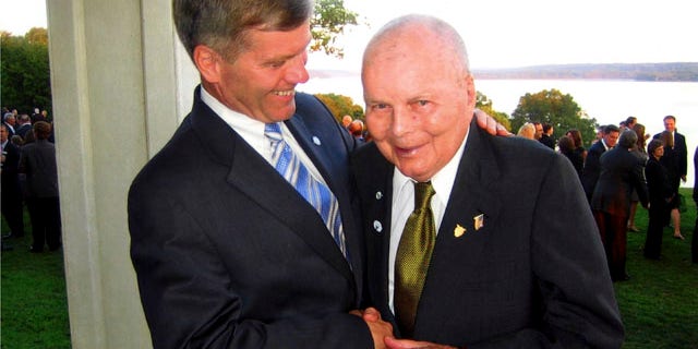 This 2006 file photo provided by the office of the Governor of Virginia, shows Virginia Gov. Bob McDonnell, left, with his father, John, in Mt. Vernon, Va.
