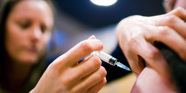 A patient receiving the measles vaccine.