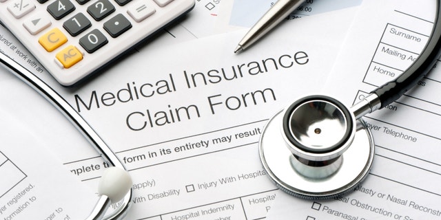 Close up of a medical insurance form with stethoscope