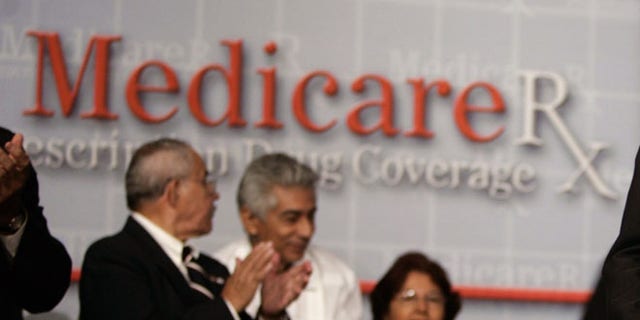FILE: Attendees of a 2006 conversation on the Medicare Prescription Drug Benefit at the Asociacion Borinquena de Florida Central in Orlando, Fla.