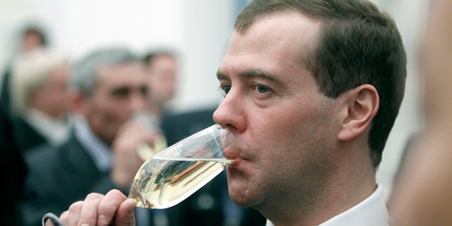 Feb. 22: Russian President Dmitry Medvedev drinks champagne during an award ceremony in the Kremlin.