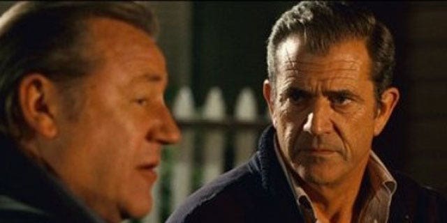 In this film publicity image released by Warner Bros.,Ray Winstone, left, and Mel Gibson are shown in a scene from, 'Edge of Darkness.'