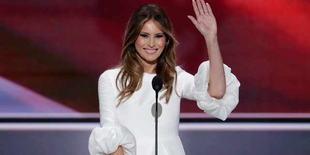 Melania Trump, wife of Republican Presidential Candidate Donald Trump waves as she speaks during the opening day of the Republican National Convention in Cleveland, Monday, July 18, 2016. (AP Photo/J. Scott Applewhite)
