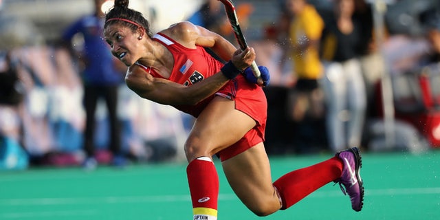 MANHEIM, PA - JULY 18: Melissa Gonzalez #5 of Team USA takes a shot against Team India in the first half during a field hockey match in preparation for the upcoming Rio Olympics on July 18, 2016 in Manheim, Pennsylvania. (Photo by Rob Carr/Getty Images)