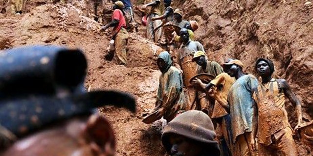 Men work in a gold mine in Chudja, northeastern Congo, one of the areas in which so-called conflict minerals are mined.