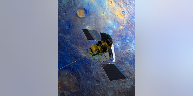 An artist's impression of the Messenger spacecraft is shown flying over Mercury's surface displayed in enhanced color.