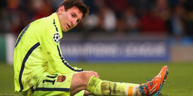 MANCHESTER, ENGLAND - FEBRUARY 24: Lionel Messi of Barcelona lies on the pitch after his penalty iwas saved by Joe Hart of Manchester City during the UEFA Champions League Round of 16 match between Manchester City and Barcelona at Etihad Stadium on February 24, 2015 in Manchester, United Kingdom. (Photo by Alex Livesey/Getty Images)