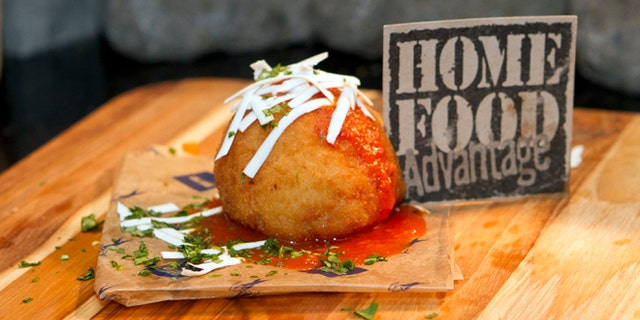 This undated image provided by New York Jets shows a rice ball from Nonna Fuscoâs.